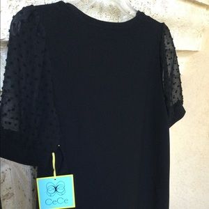 CeCe puff sleeve black tee. Medium. 95% Polyester / 5% Spandex